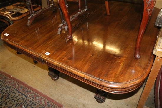 A late 19th century French mahogany extending dining table
